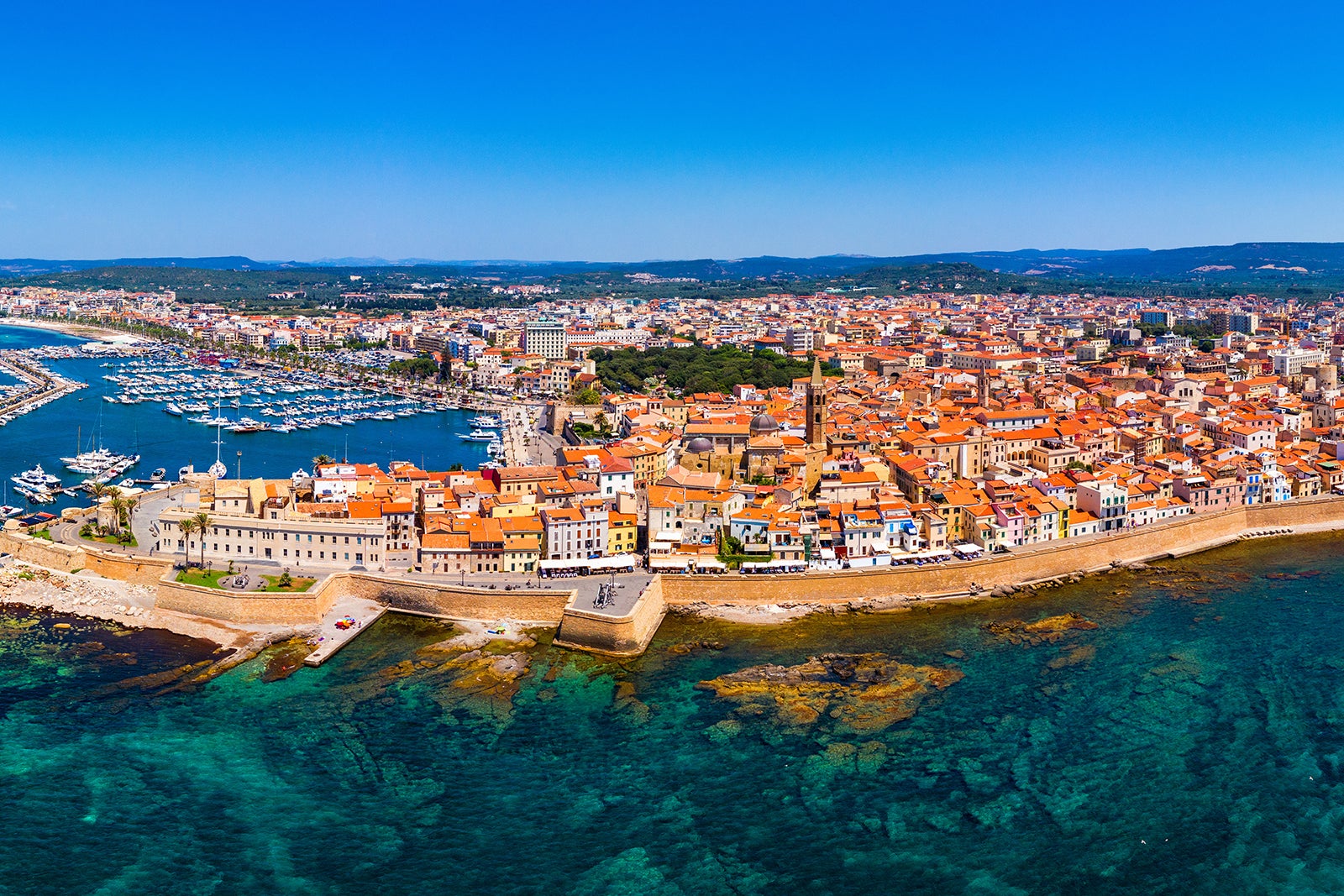 Exploring the Stunning Coastal Roads: Scenic Drives from Alghero with Our Rental Cars